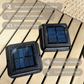 Set mit 2 quadratischen Solar-Gartenleuchten zum Aufstellen warmweiße LED-Befeuerung 2x QUADRY 12x12cm